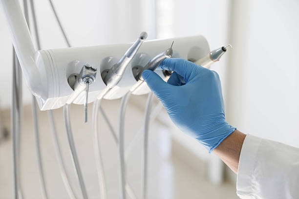 Professional Emergency Dentist technician working in McLoud, OK